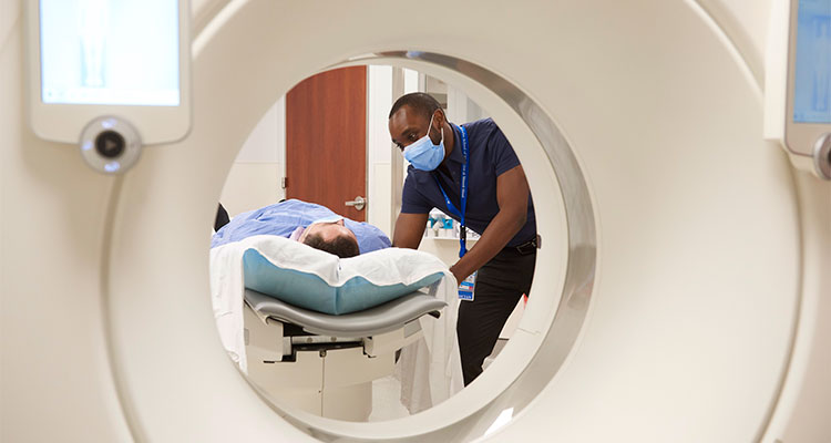 resident care for patient in MRI room